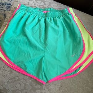 Neon Nike running shorts